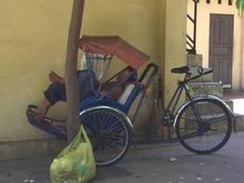 taking a nap in a cyclo